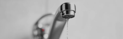 Sink faucet dripping water